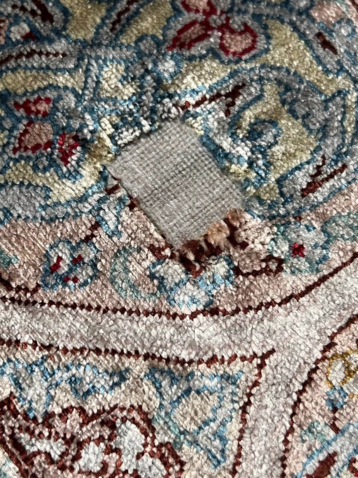 Detailed hand-knotted Persian rug craftsmanship